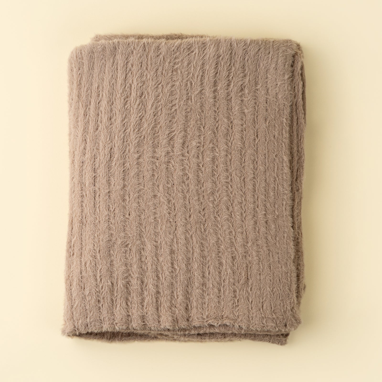 Tuffet Snug Throw